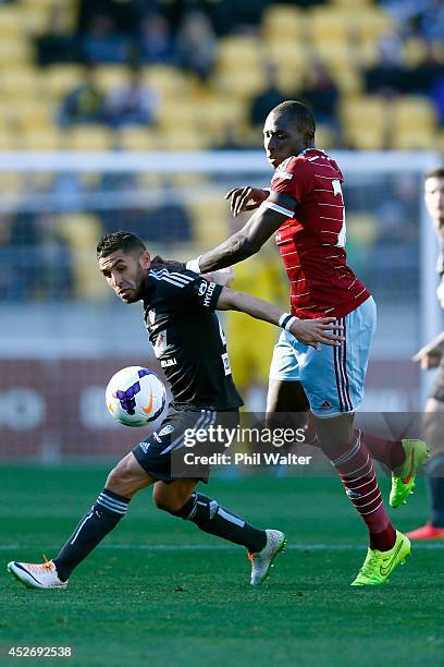 Ali Abbas of Sydney FC is tackled by Mohamed Diame of West Ham during the Football United New Zealand Tour match between Sydney FC and West Ham...