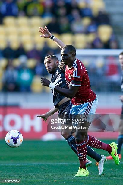 Ali Abbas of Sydney FC is tackled by Mohamed Diame of West Ham during the Football United New Zealand Tour match between Sydney FC and West Ham...
