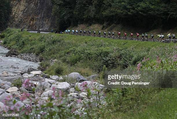The group of the yellow jersey descends the Col du Tourmalet during the eighteenth stage of the 2014 Tour de France, a 146km stage between Pau and...