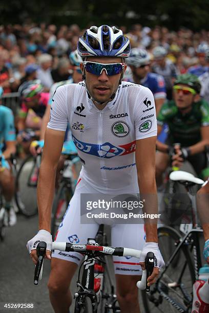 Thibaut Pinot of France and FDJ.fr in the best young rider's white jersey prepares for the start of the eighteenth stage of the 2014 Tour de France,...