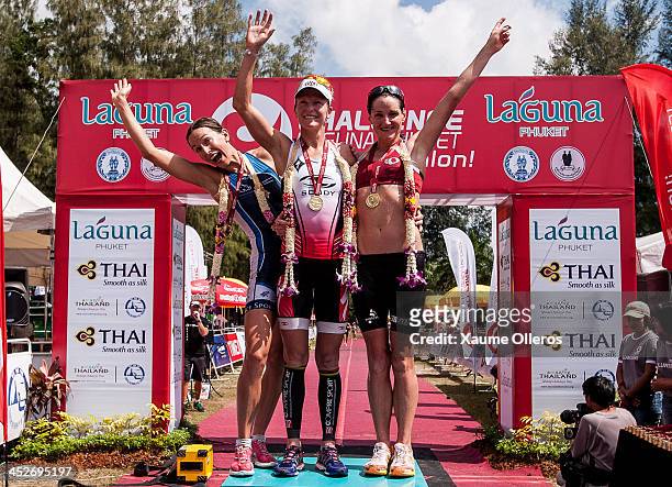 Radka Vodickova of Czech Republic, Melissa Hauschildt of Austria and Tamsin Lewis of Great Britain celebrate their podium finish during the Phuket...