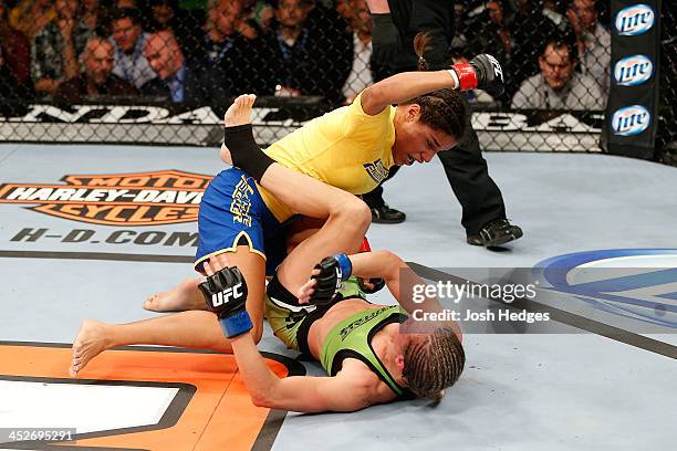 Julianna Pena punches Jessica Rakoczy in their women's bantamweight final fight during The Ultimate Fighter season 18 live finale inside the Mandalay...