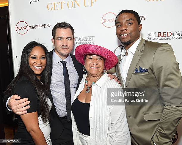 Yamma Brown, Tate Taylor, Deidre Jenkins Brown, and Chadwick Boseman attends the Get On Up premiere at Regal Cinemas-Atlantic Station on July 25,...