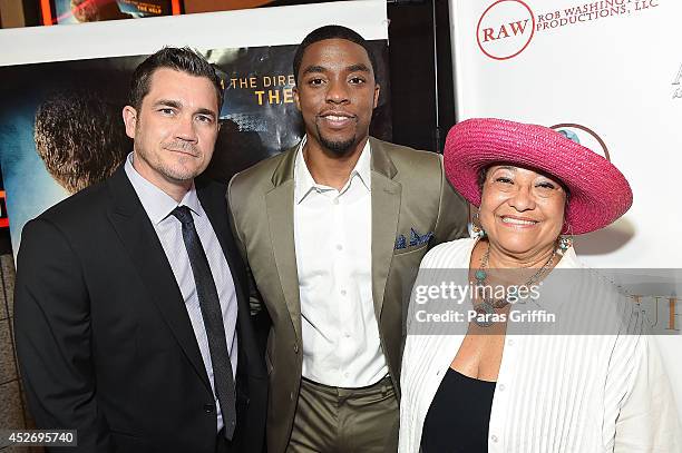 Tate Taylor, Chadwick Boseman and Deidre Jenkins Brown attends the Get On Up premiere at Regal Cinemas-Atlantic Station on July 25, 2014 in Atlanta,...