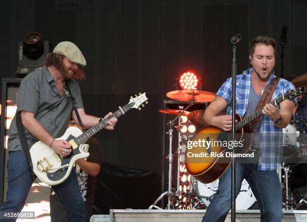 James Young and Mike Eli of Eli Young Band perform at Country Thunder USA - Day 2 on July 25, 2014 in Twin Lakes, Wisconsin.