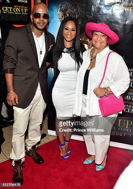 Yamma Brown, Diedre Jenkins Brown attend the screening of Get On Up at Regal Atlantic Station on July 25, 2014 in Atlanta, Georgia.