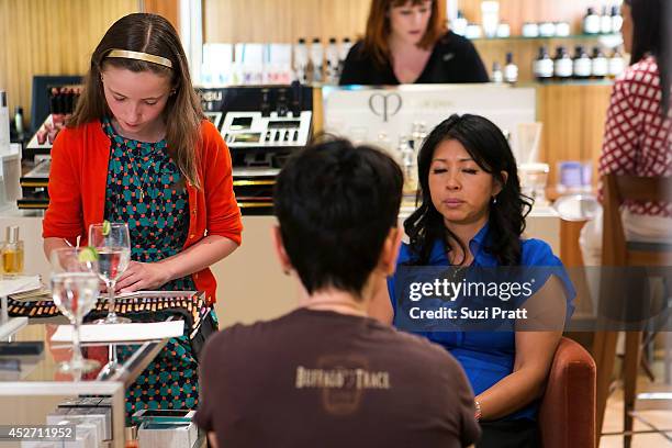 Yosh Han closes her eyes during a private consultation at Barney's New York on July 25, 2014 in Seattle, Washington.