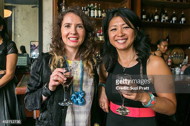 Barbara Kucharz and Yosh Han at The Kingfish Cafe on July 25, 2014 in Seattle, Washington.