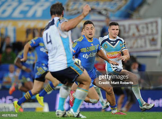 Jarryd Hayne of the Eels runs the ball during the round 20 NRL match between the Gold Coast Titans and the Parramatta Eels at Cbus Super Stadium on...