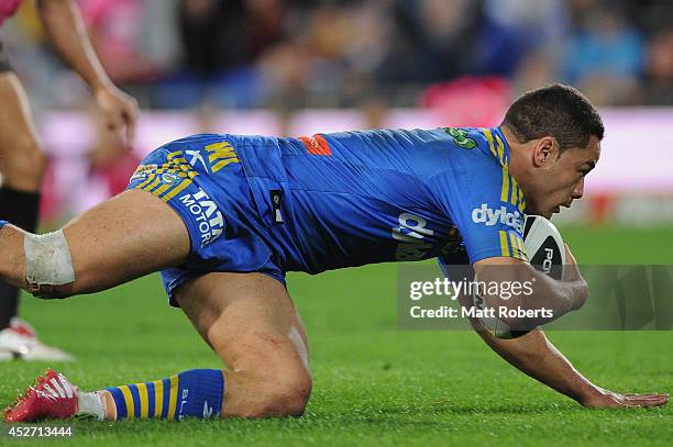 Jarryd Hayne of the Eels scores a try during the round 20 NRL match between the Gold Coast Titans and the Parramatta Eels at Cbus Super Stadium on...