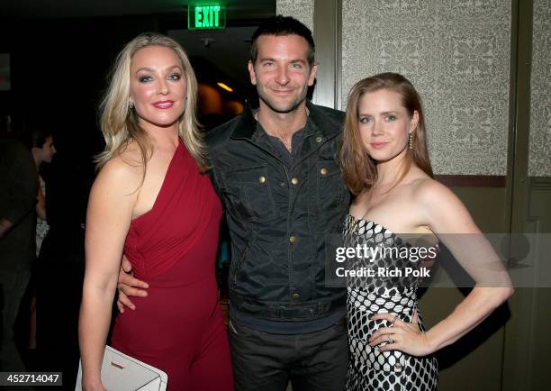 Actors Elisabeth Rohm, Bradley Cooper, and Amy Adams attend PANDORA Jewelry and Moto X present 'American Hustle' at cinema prive at on November 30,...