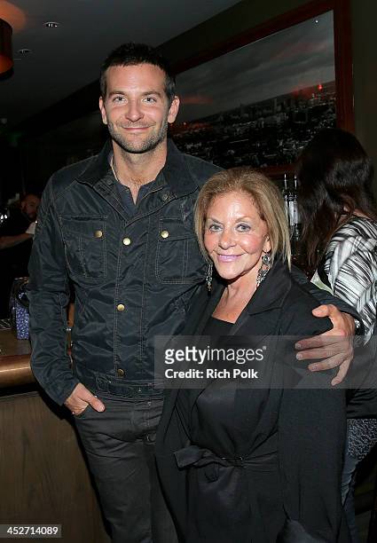 Actor Bradley Cooper and mother Gloria Campano attend PANDORA Jewelry and Moto X present 'American Hustle' at cinema prive at on November 30, 2013 in...