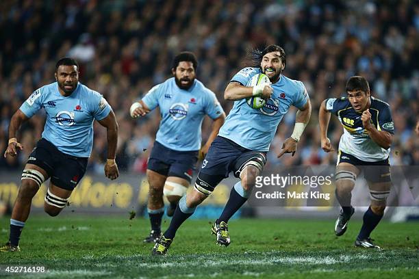 Jacques Potgieter of the Waratahs makes a break during the Super Rugby Semi Final match between the Waratahs and the Brumbies at Allianz Stadium on...