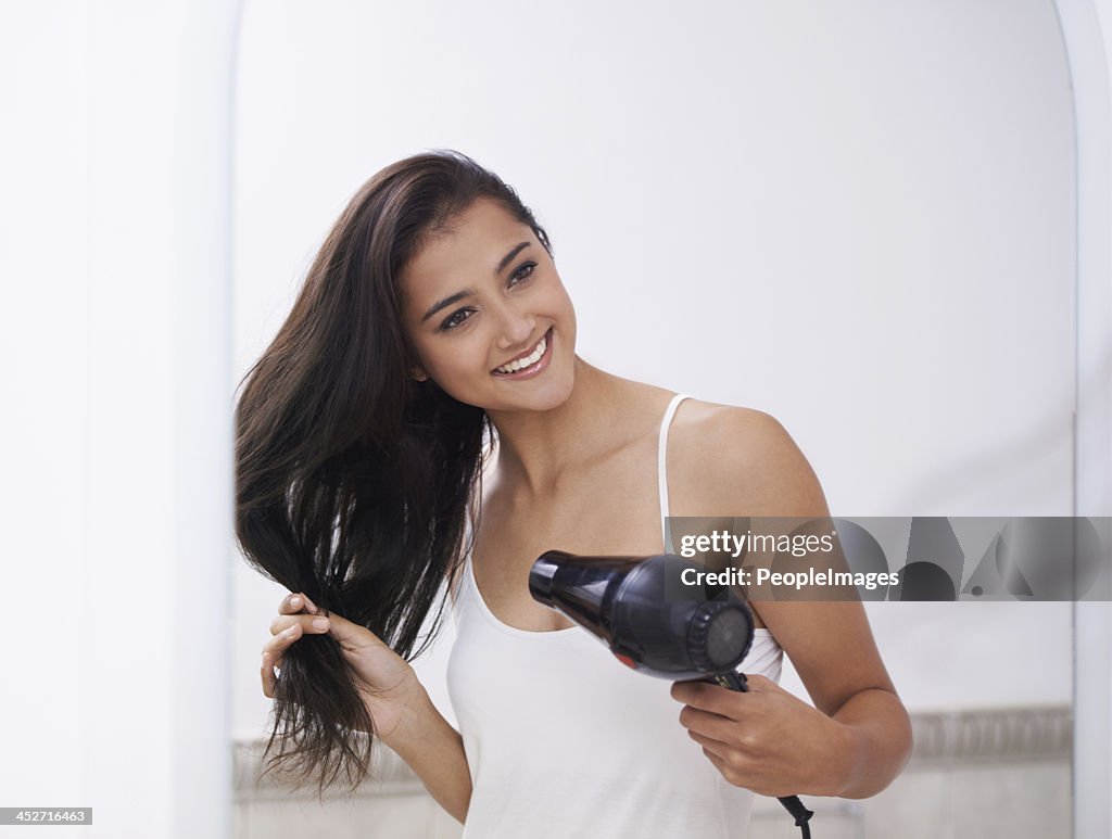 Ensuring that her hair stays smooth and sleek