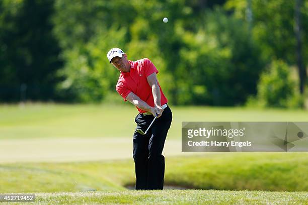 David Horsey of England chips onto the green at the ninth on day three of the M2M Russian Open at Tseleevo Golf & Polo Club on July 26, 2014 in...