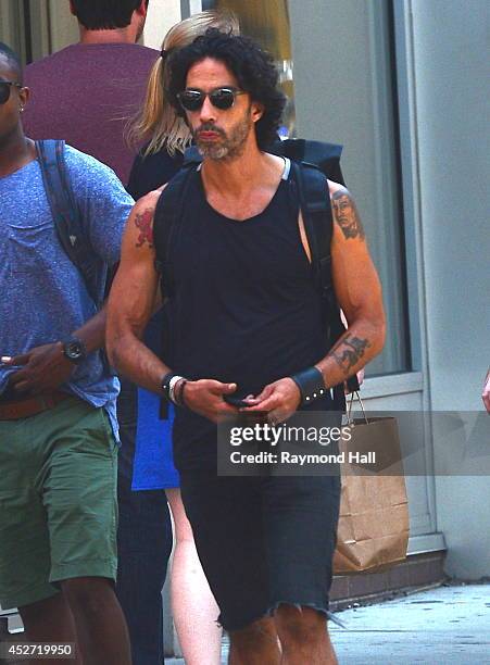 Personal Trainer Carlos Leon is seen in Soho on July 25, 2014 in New York City.