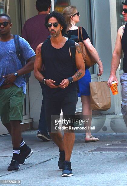 Personal Trainer Carlos Leon is seen in Soho on July 25, 2014 in New York City.