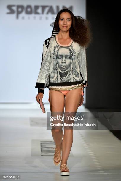 Model walks the runway at the Sportalm Show during Platform Fashion Dusseldorf on July 26, 2014 in Duesseldorf, Germany.