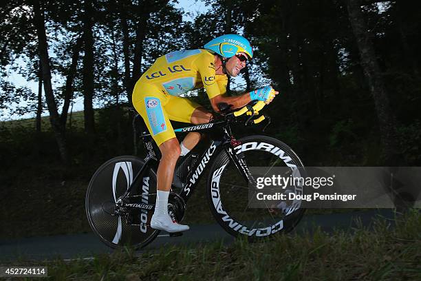 Vincenzo Nibali of Italy and the Astana Pro Team races to fourth place in the individual time trial and defended the overall race leader's jersey...