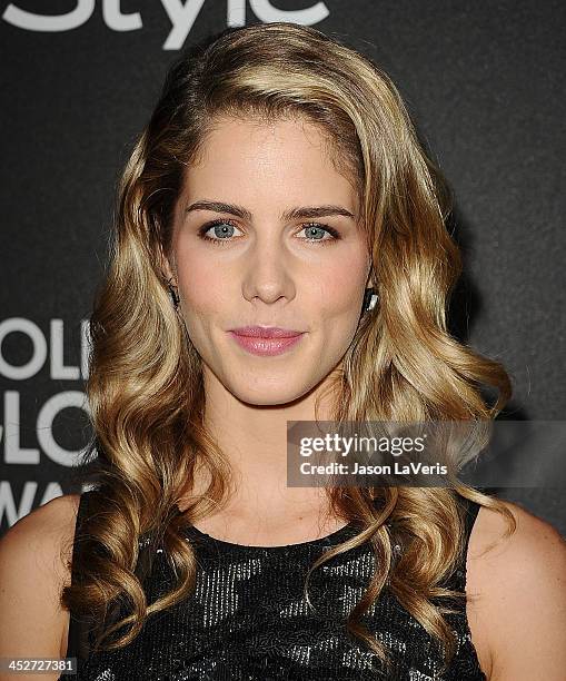 Actress Emily Bett Rickards attends the Miss Golden Globe event at Fig & Olive Melrose Place on November 21, 2013 in West Hollywood, California.