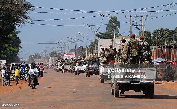 Soldiers of Central African Republic ex-rebel group Seleka patrol in vehicles in a street of Bangui on December 1, 2013. Paris will host on December...