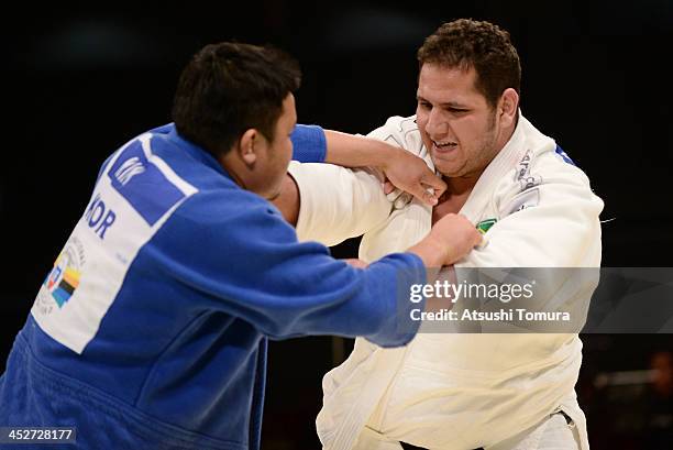 Rafael Silva of Brazil and Sung-Min Kim of Korea compete in the men's +100kg final match during day three of the Judo Grand Slam at the on December...