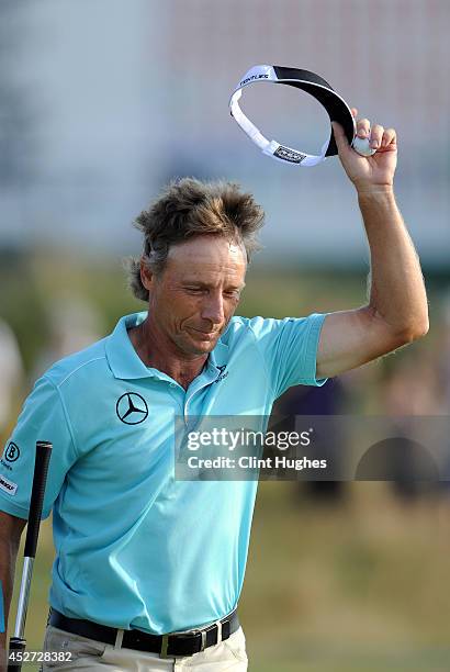 Bernhard Langer of Germany waves to the crowd after he fineshes his round during the third round of the Senior Open Championship at Royal Porthcawl...