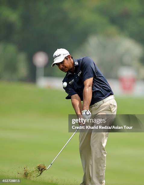 Gaganjeet Bhullar of India plays a shot during round four of the Indonesia Open at Pantai Indah Kapuk on December 1, 2013 in Jakarta, Indonesia.