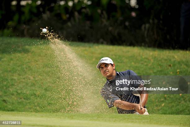 Gaganjeet Bhullar of India plays a shot during round four of the Indonesia Open at Pantai Indah Kapuk on December 1, 2013 in Jakarta, Indonesia.