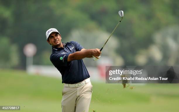 Gaganjeet Bhullar of India plays a shot during round four of the Indonesia Open at Pantai Indah Kapuk on December 1, 2013 in Jakarta, Indonesia.