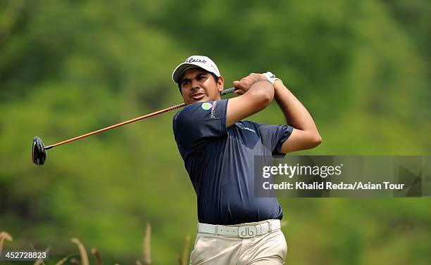 Gaganjeet Bhullar of India plays a shot during round four of the Indonesia Open at Pantai Indah Kapuk on December 1, 2013 in Jakarta, Indonesia.