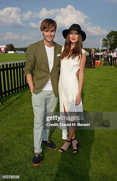 Douglas Booth and Sarah Ann Macklin attend Audi International at Guards Polo Club, near Windsor, to support England as it faces Argentina for the...