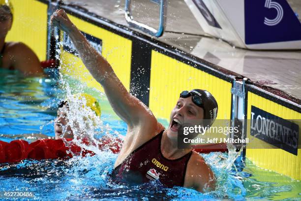 Francesca Halsall of England celebrates winning the gold medal in the Women's 50m Freestyle Final at Tollcross International Swimming Centre during...