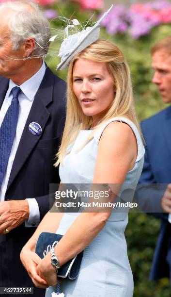 Autumn Phillips watches the horses in the parade ring as she attends the King George Day Meet at Ascot Racecourse on July 26, 2014 in Ascot, England.