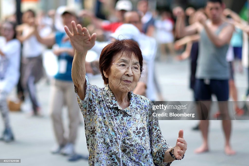 People Take Part In Tai Chi Training At Roppongi Hills