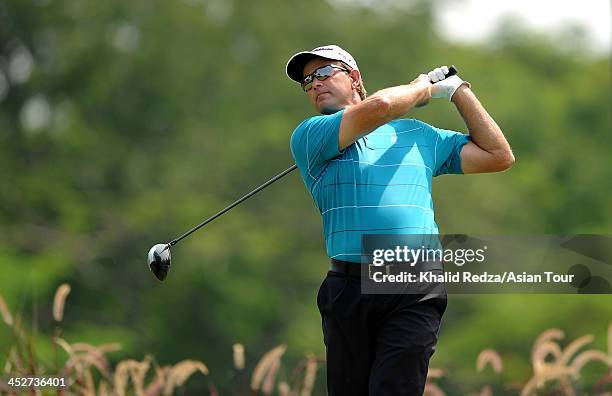 Retief Goosen of South Africa in action during round four of the Indonesia Open at Pantai Indah Kapuk on December 1, 2013 in Jakarta, Indonesia.