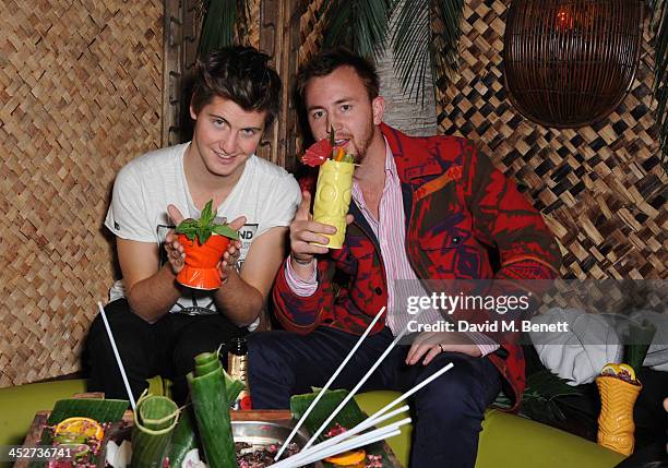 Stevie Johnson and Francis Boulle attend the Kanaloa Winter Cocktails launch on November 29, 2013 in Croydon, England.