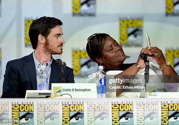 Actors Colin O'Donoghue and Retta attend the TV Guide Magazine: Fan Favorites panel during Comic-Con International 2014 at the San Diego Convention...