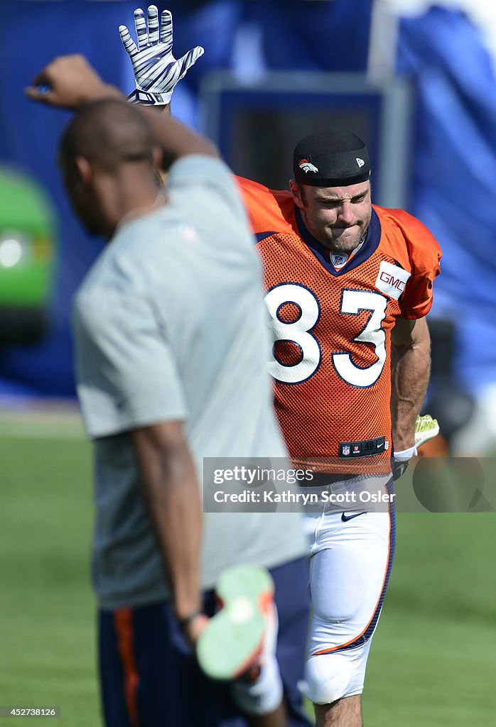 The Denver Broncos football team hold their workouts for the team during mini-camp at Dove Valley in Centennial on Saturday, July 26, 2014.