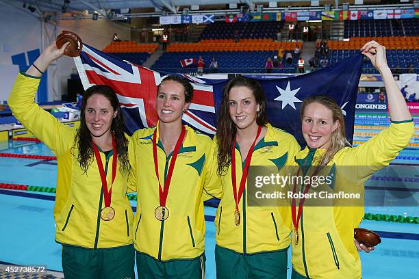 Gold medallists Alicia Coutts, Emma McKeon, Brittany Elmslie and Bronte Barratt of Australia pose after the medal ceremony for the Women's 4 x 200m...