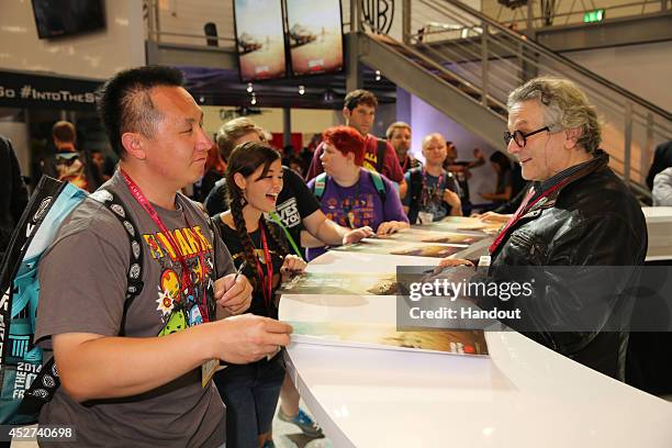 In this handout photo provided by Warner Bros, George Miller of "Mad Max: Fury Road" attend Comic-Con International 2014 on July 26, 2014 in San...