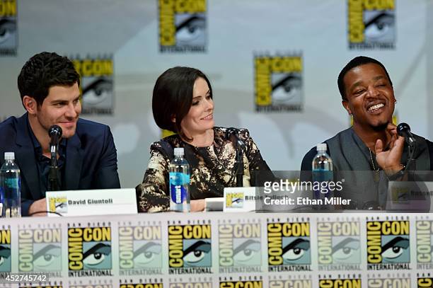 Actors David Giuntoli, Bitsie Tulloch and Russell Hornsby attend the "Grimm" season four panel during Comic-Con International 2014 at the San Diego...