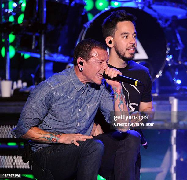 Singer Chester Bennington and musician Mike Shinoda of Linkin Park perform onstage during the MTVu Fandom Awards at Comic-Con International 2014 at...