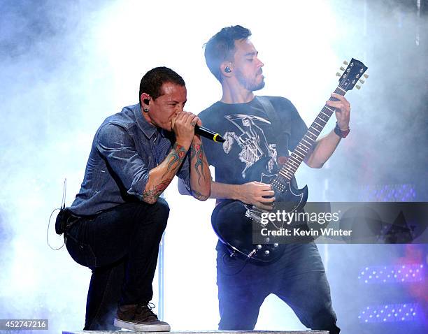 Singer Chester Bennington and musician Mike Shinoda of Linkin Park perform onstage during the MTVu Fandom Awards at Comic-Con International 2014 at...