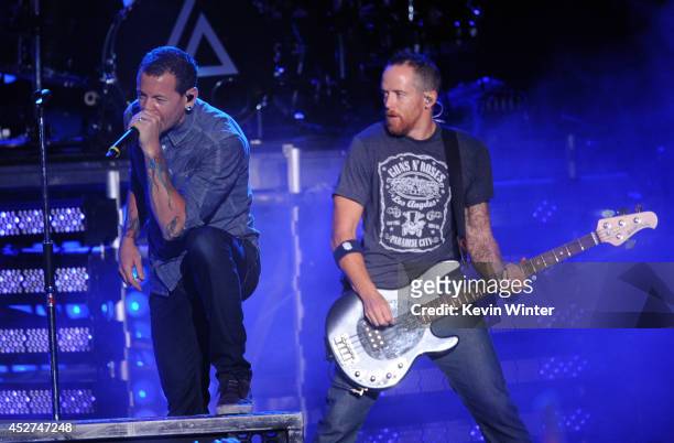 Singer Chester Bennington and musician Dave Farrell of Linkin Park performs onstage during the MTVu Fandom Awards at Comic-Con International 2014 at...
