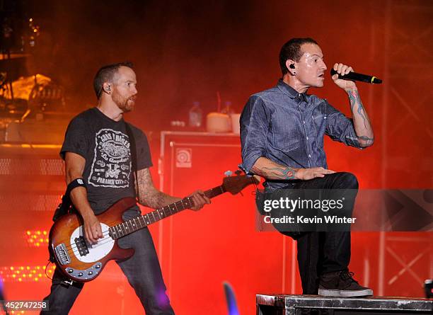 Musician Dave Farrell and singer Chester Bennington of Linkin Park perform onstage during the MTVu Fandom Awards at Comic-Con International 2014 at...