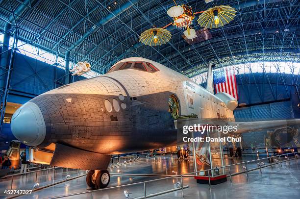 The Space Shuttle Enterprise within a hangar in the National Air and Space Museum's Steven F. Udvar-Hazy Center at Dulles International Airport in...