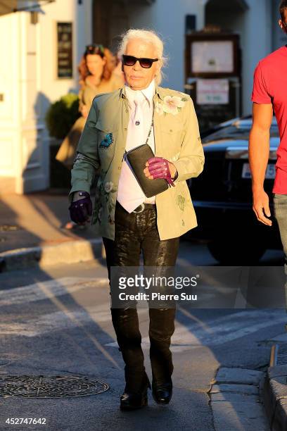 Karl Lagerfeld is seen strolling on the port on July 26, 2014 in Saint-Tropez, France.