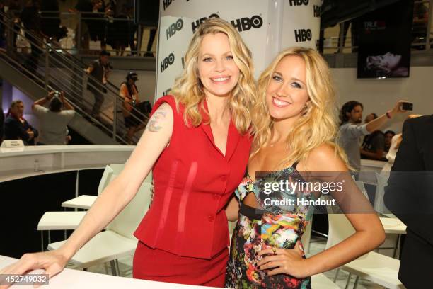 In this handout photo provided by Warner Bros, Kristin Bauer van Straten and Anna Camp of "True Blood" attend Comic-Con International 2014 on July...