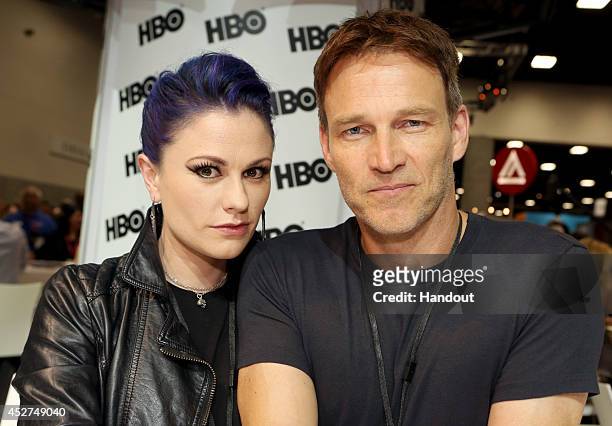 In this handout photo provided by Warner Bros, Anna Paquin and Stephen Moyer of "True Blood" attend Comic-Con International 2014 on July 26, 2014 in...